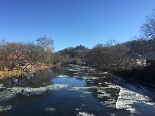 Chunks of ice float in the Tuckasegee River here in January 2018 during a cold spell.