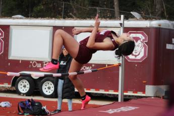 Larry Griffin/SMT Freshman Lelani Queen does the high jump at the home track and field meet on Wednesday, Nov. 15.