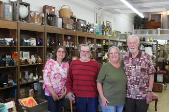 From left, Teresa Conner, Ivan Gibby, Terrie Stephens and Frank Calhoun are pictured inside Calby’s, an antique store downtown. Conner and Stephens have recently partnered with Gibby and Calhoun to lease the business for a year.
