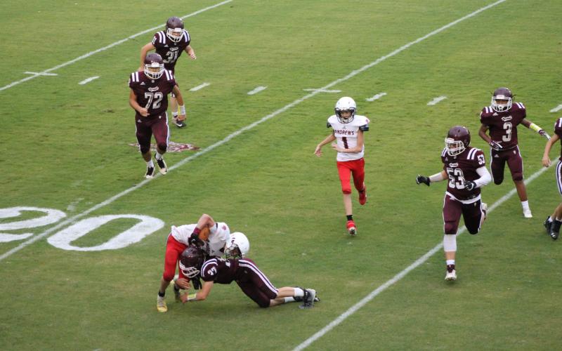 Maroon Devil ninth grader Druw Cody takes down an Andrews Wildcat on the carry.