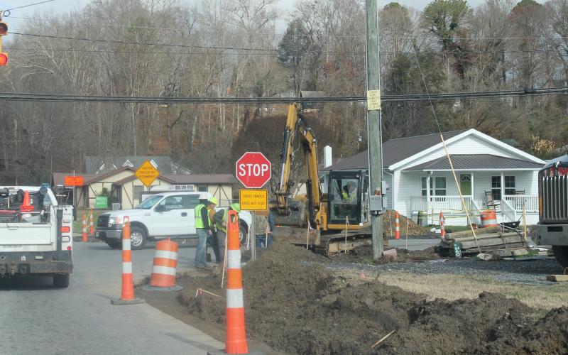 Photo by Jessica Webb/SMT Contractors work on intersection improvements at Bryson Walk and Slope Street on Wednesday, Nov. 16. The work is slated for completion in spring 2023. The traffic pattern is not set to change.