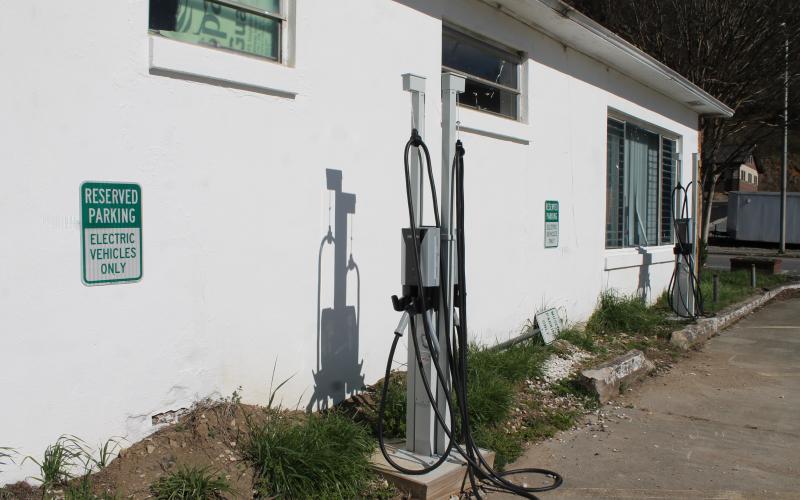The electric vehicle charging stations in downtown Bryson City are located in the parking lot behind the heritage museum.