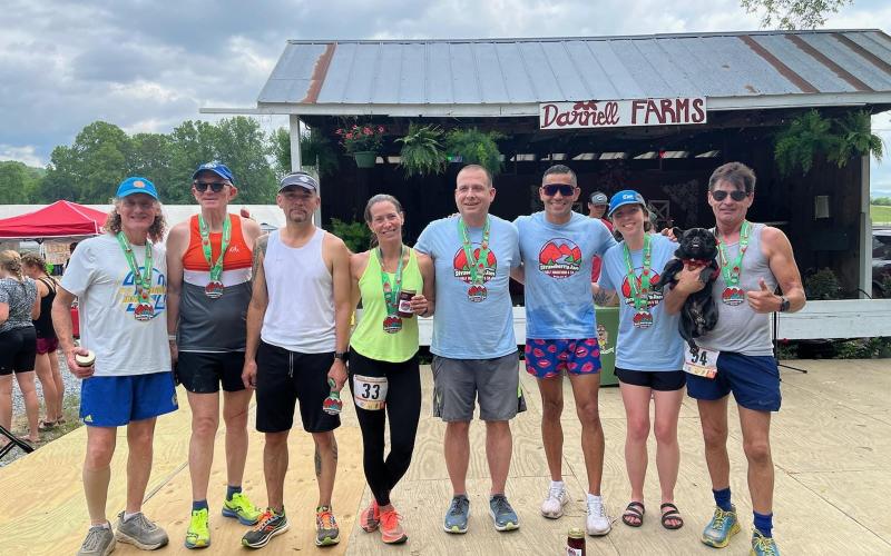 Several members of the BCOutdoors Run Club at last year’s Strawberry Jam half marathon at Darnell Farms. They are planning to do it again this year, according to club founder Kelli Walsh (pictured second from right).