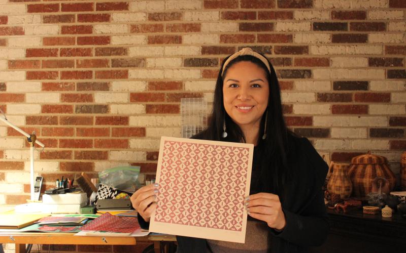 Cherokee artist Skye Tafoya specializes in patterned paper weaving art, which she sells to make a living.