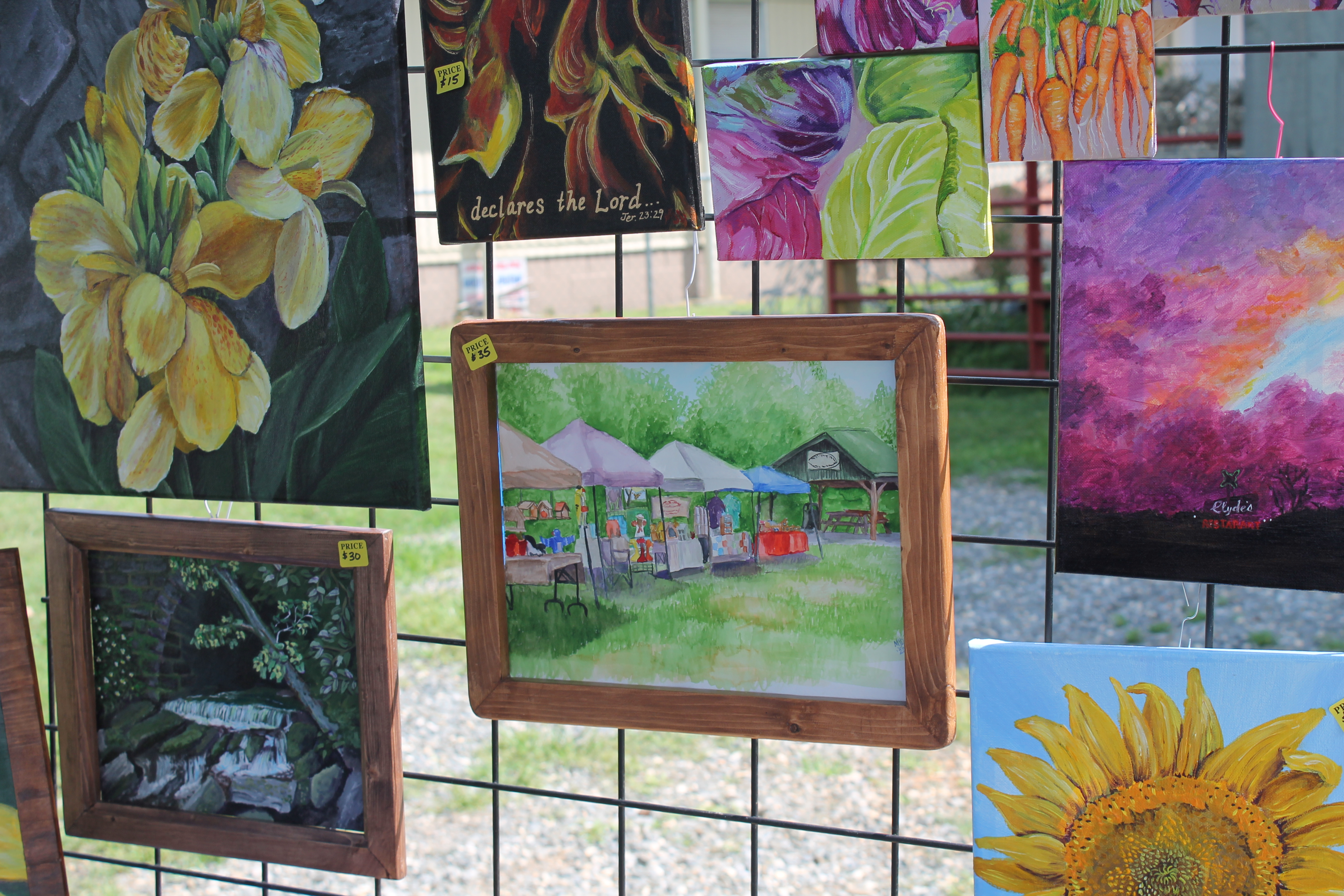 Melinda Donaldson’s painting of the farmers and artisans market is among several of those she has for sale. 