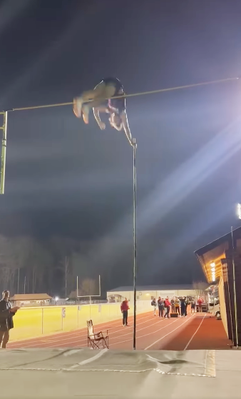 Matthew Gray makes a pole vaulting record.