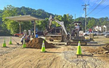 Photo by Sara Eisinger - Town of Bryson City crews work on Greenlee Street June 5.