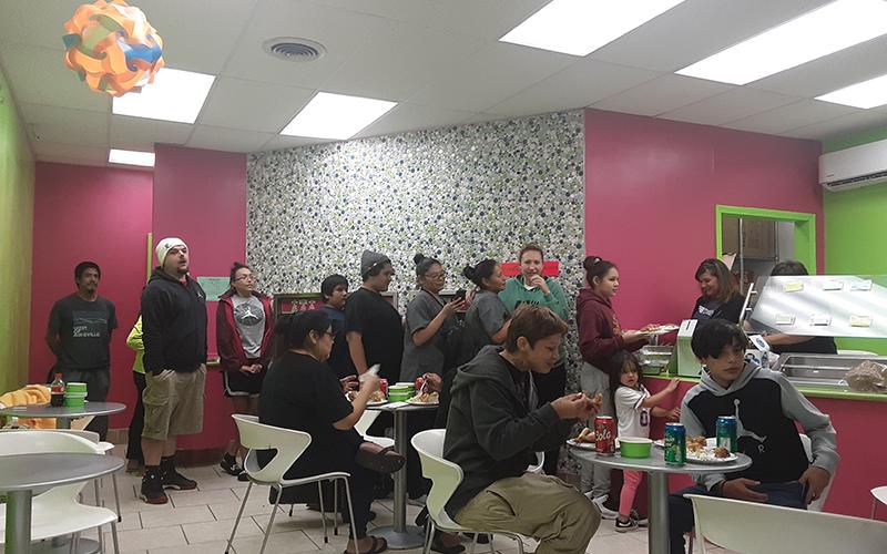 People enjoy a meal