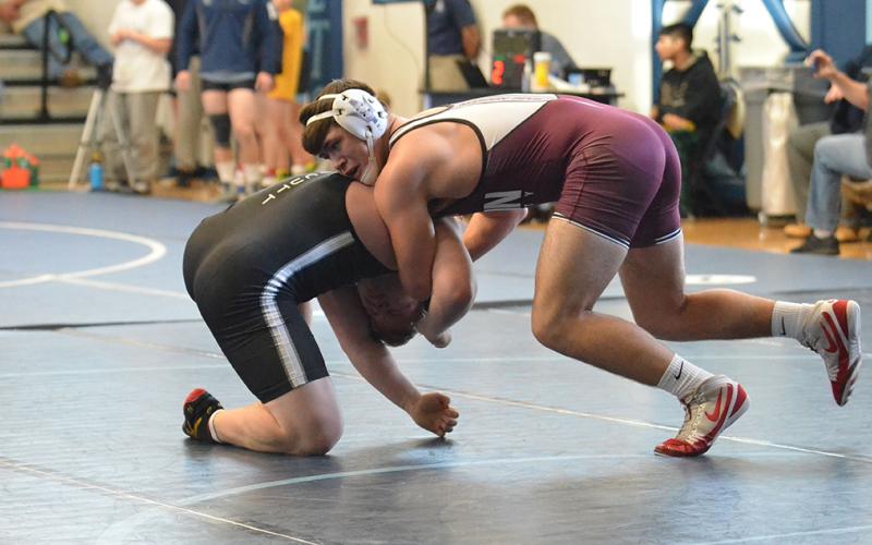 Cody Long competes at the Enka Duals.