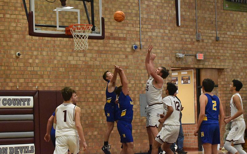 Swain Maroon Devil Nick Millsaps shoots in the home win over the Highlanders.