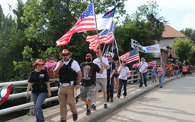 March down Everett Street sidewalk