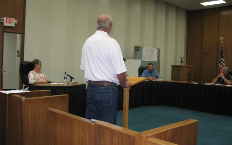 Mark Day speaks before the town board