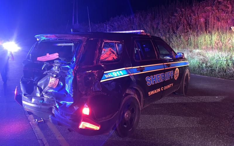 An alleged drunk driver crashed into the back of a Swain County Sheriff's Deputy vehicle