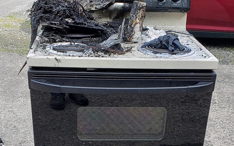The coffee maker and stove were destroyed