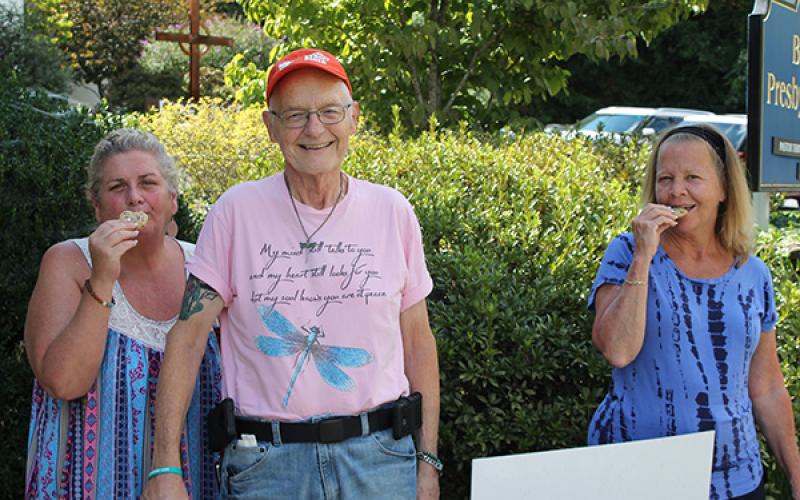 Sam Brandt is called “Sam, the cookie man” at The Giving Spoon for the cookies he bakes and donates. From left is Janet Carter, Sam Brandt and Maureen Murphy.