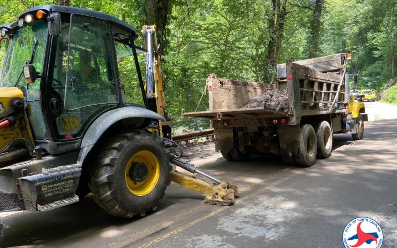 A mudslide is cleared
