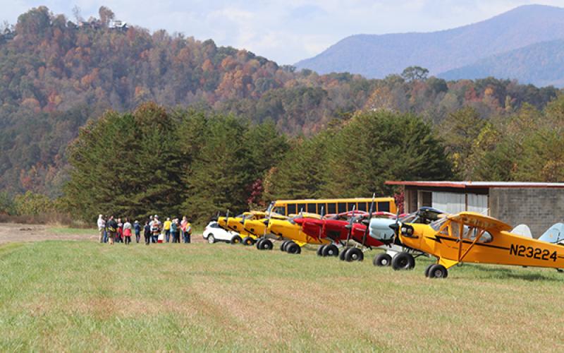 The club planes with the mountains in the background