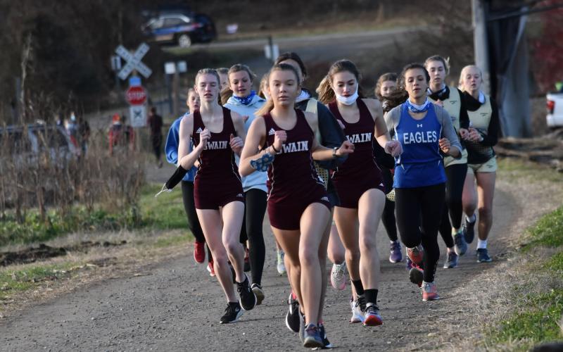 Lady Devils lead a pack of runners at the recent meet at Kituwah