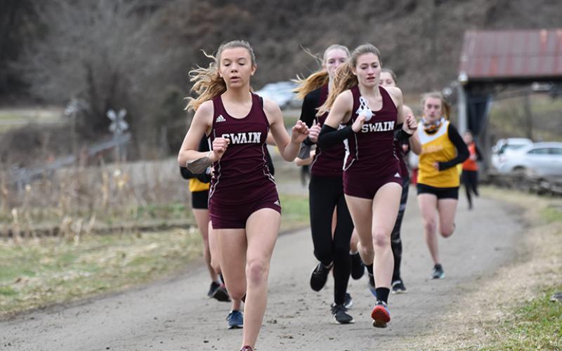 Lady Devils Gracie Monteith and Emily Ulaner were among the top two runners in the recent meet Dec. 30 at Kituwah Mound.