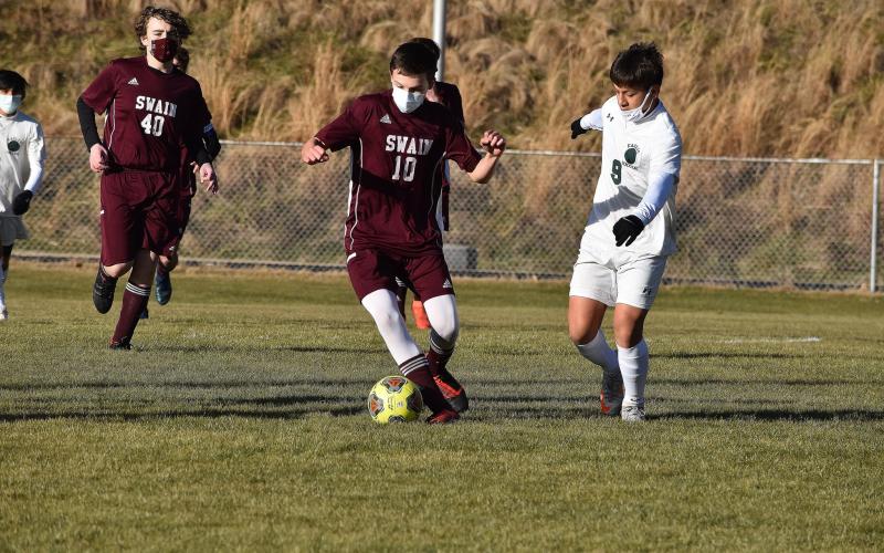 Maroon Devil Matthew Grey takes control of the ball in a home scrimmage last week