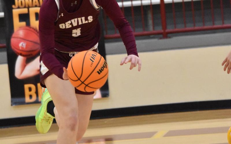 Mazie Helpman notched her 1,000th career point during the Lady Devils’ 64-52 loss at Cherokee