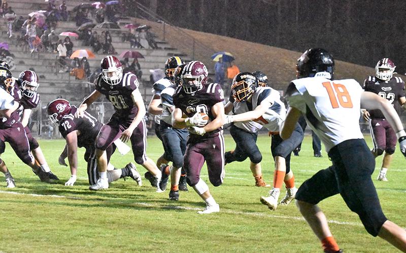 Andrew Chavez runs the ball downfield
