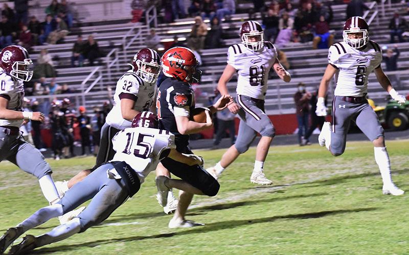 Maroon Devil Cooper Hyatt makes a tackle in the Andrews game