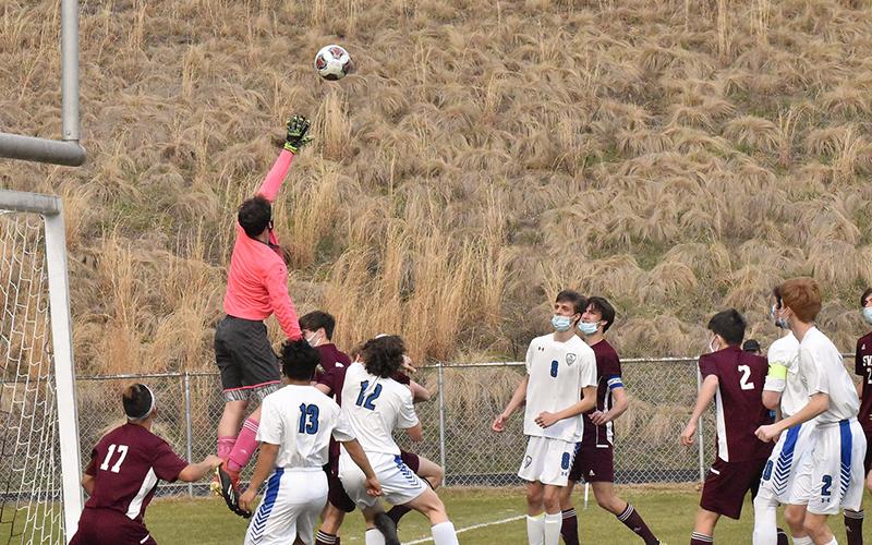 Noel Wolf clearing a ball