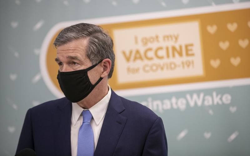 Gov. Roy Cooper visited Wake County’s Human Services Center in Raleigh to see people receive their vaccines.