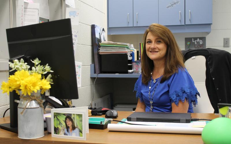 Lisa Sutton at her desk