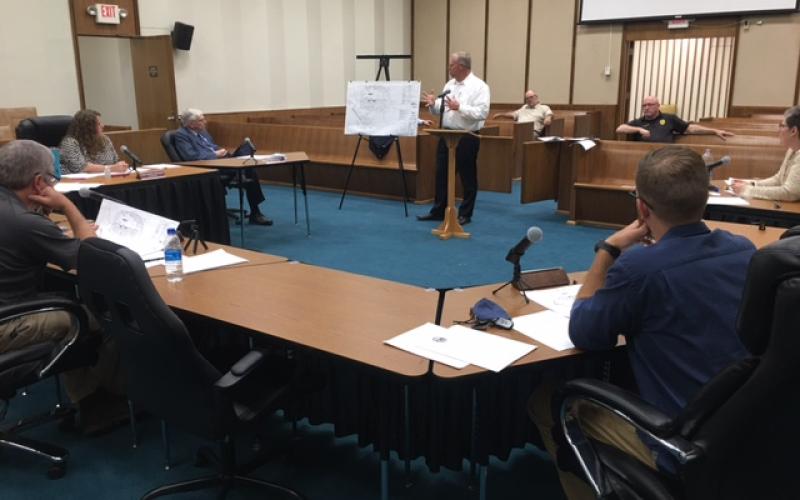The board hears Preston Kendall from Ingles talk about plans for the new store