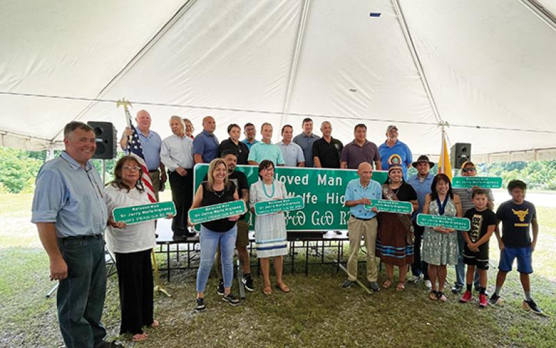 Eastern Band of Cherokee Indians tribal leaders unveiled the new sign for the new stretch of Highway 441 honoring respected elder and storyteller Dr. Jerry Wolfe