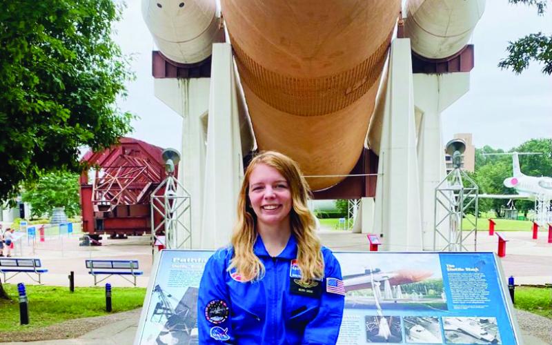 Kierra Shook is pictured at the U.S. Space and Rocket Center in Huntsville, Alabama, in her very own flight suit with her name on it.