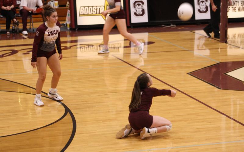 Freshman Kaley Parker dives for the ball for a save Tuesday