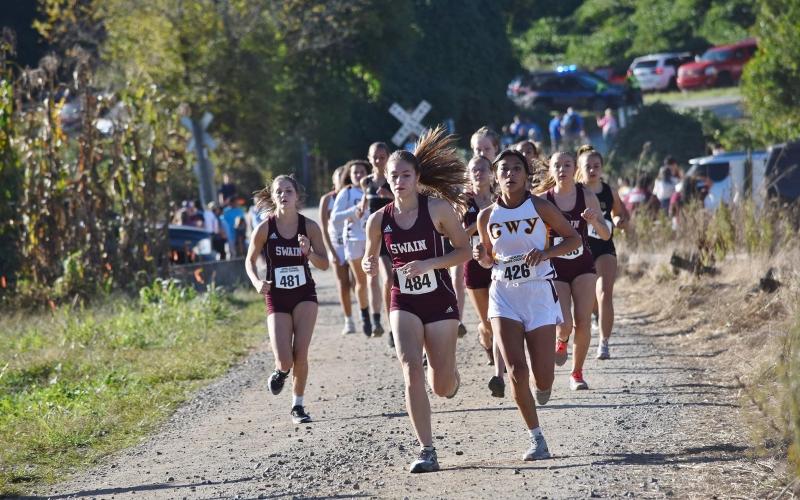 Swain hosted the Smoky Mountain Conference Championship meet on Wednesday at Kituwah. The girls, above, were named Conference Champs