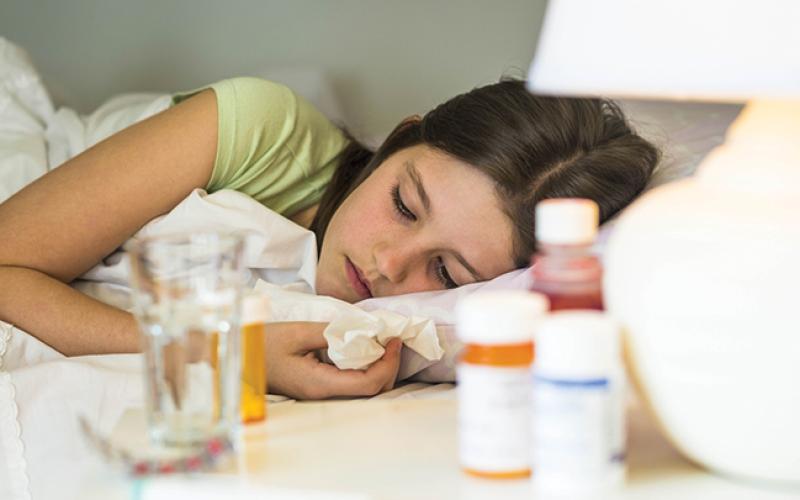Girl sick with the flu