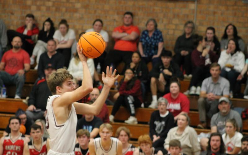 Photo by Hannah Styles/SMT Cooper Hyatt bounds above the opponents’ heads for an incredible shot against Andrews.