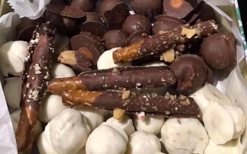 Peanut butter balls, coconut balls, and chocolate dipped pretzels.