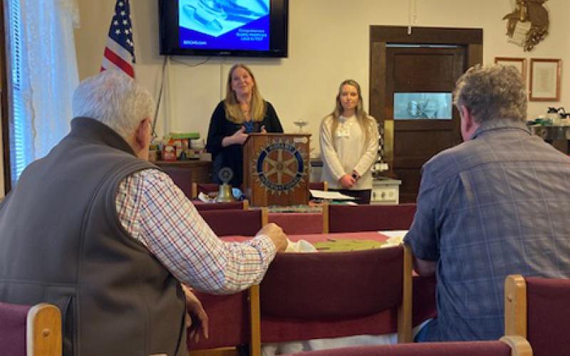 Charley Rice Thompson, BRH communications manager, and Miranda Massingale, clinical support staff at Swain, presenting before Rotary Club.