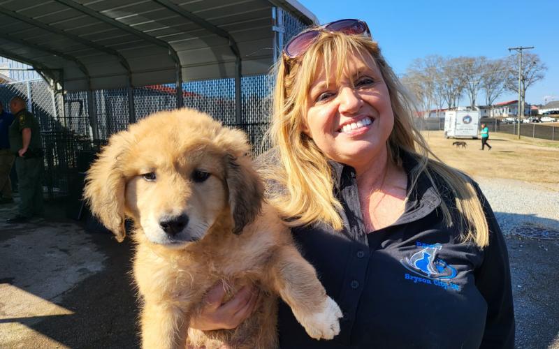 Beth Cline-Stroud with a puppy rescued in S.C.