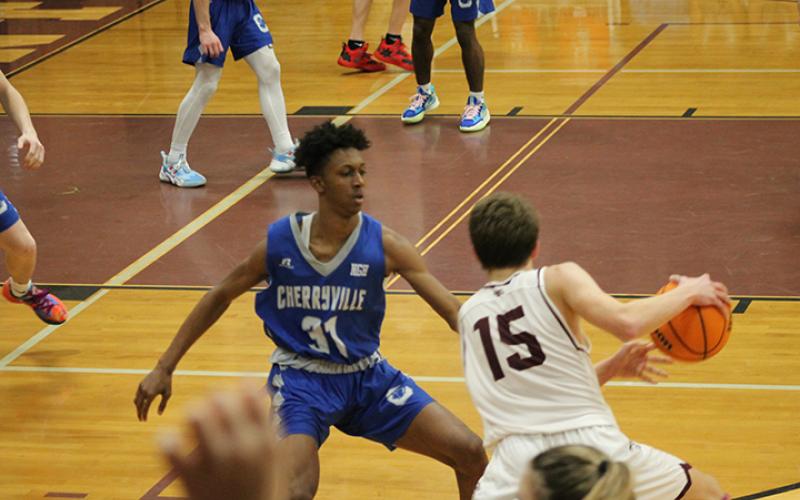 Cooper Hyatt darts back and forth to avert a Cherryville player