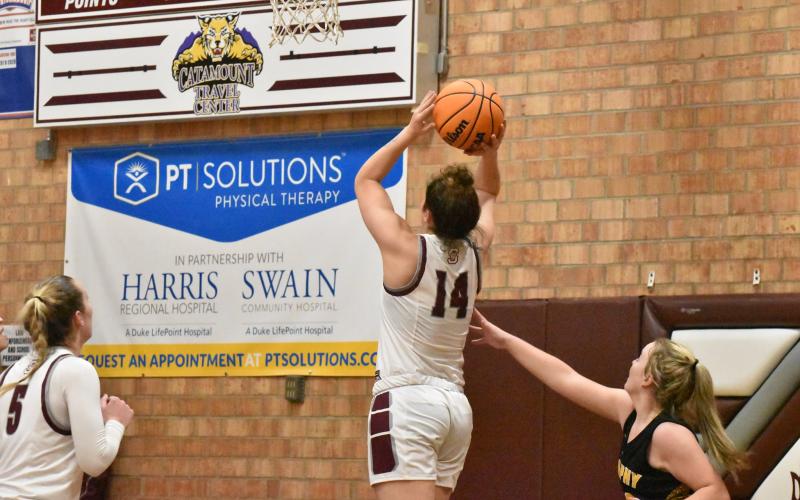 Photo by Joanna McMahan Lady Devils Savana Smith scores in the home game last week against Murphy.