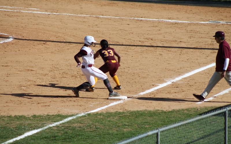 Haileigh Woodard sprints to third base. She had two hits and two runs for the game against Cherokee.