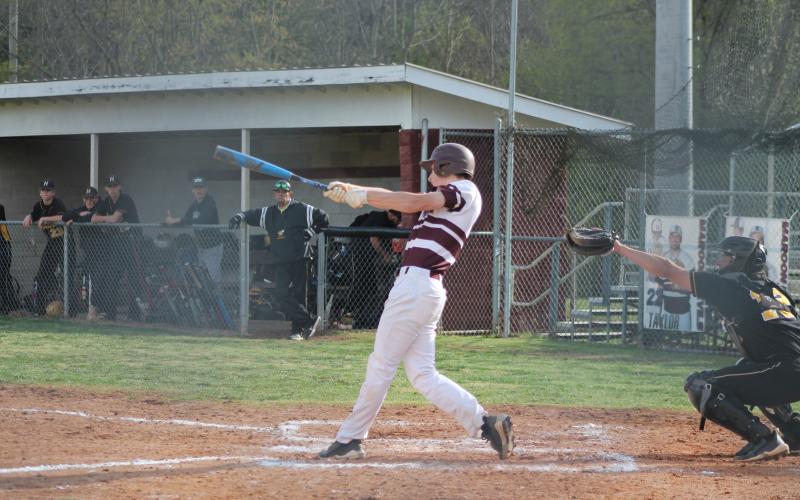 Sophomore Brayden Ruis swings at the 4-0 shutout game against the Yellow Jackets last Thursday.