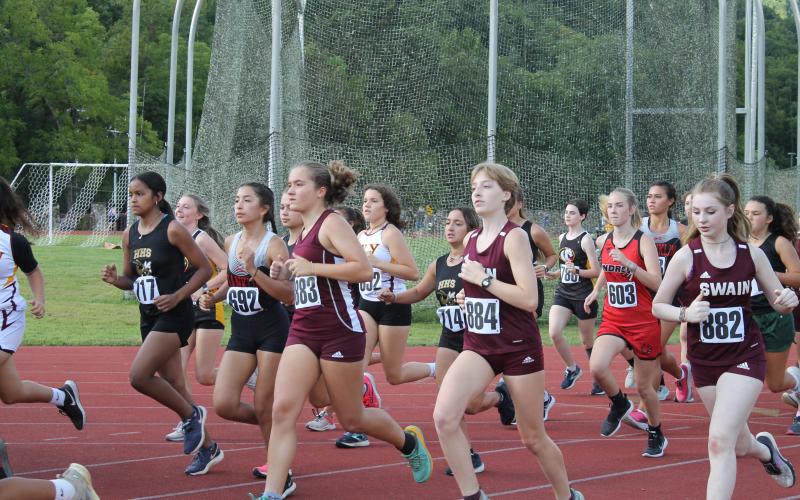 And they’re off! Lady Devils cross country take off at the Cherokee meet last week where they took first place.