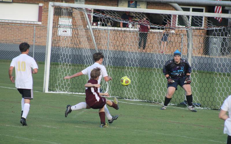 Sophomore Clayton Shuler goes for a goal against Hayesville. Shuler was named the Player of the Game.