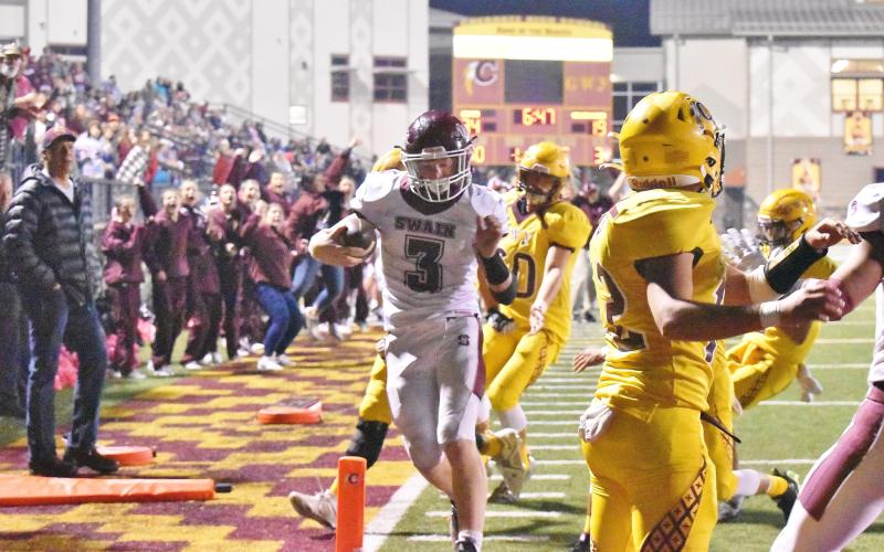 Joshua Collins advances the ball