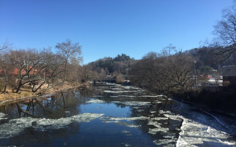 Chunks of ice float in the Tuckasegee River here in January 2018 during a cold spell.