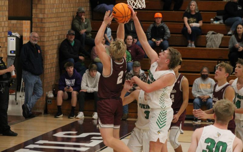 Maroon Devil Josh Collins goes up for a basket, battling it out with a North Stokes Viking during last week’s basketball tournament.