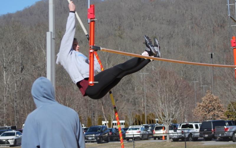 Swain County's Alden Thomas pole vaults at the SMC Indoor Championships